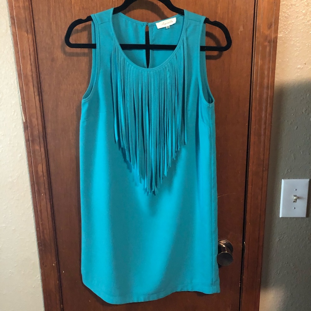 Turquoise 👗dress with fringes on round neck